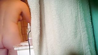 Chubby asian girl spied in bathroom