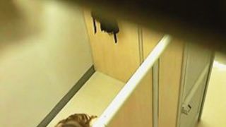 Spy cam in a changing room ceiling captures some tits