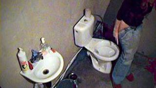 Toilet voyeur pissing