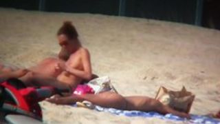 Sexy blonde and naughty brunette on nude beach