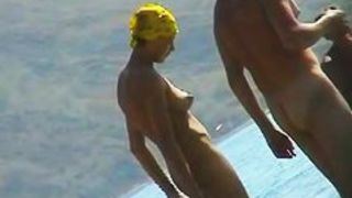 Skillful voyeur smuggled a camera to a nudist beach