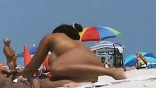 Sexy babes filmed playing on the beach