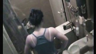 College chick was filmed in the shower by her crazy neighbor