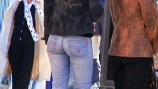 Modest looking blonde woman with cheeky ass in the street candid scene