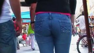 Hot ass in tight jeans swaying in front of a candid cam