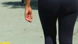 Juicy ass in black tights wiggling around candid camera