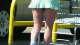 Good looking teen in accidental up skirt shot in a parking lot