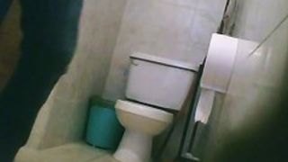 Hidden toilet cam catches chubby Latina chick pissing
