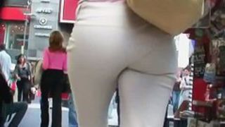 horny ass chick street candid dark curly hair in tight trousers