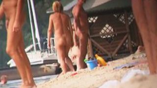 Voyeur nudist beach video with sexy blonde