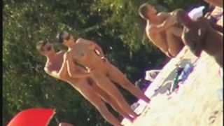 Nude spy cam on the beach with a black hair goddess in focus