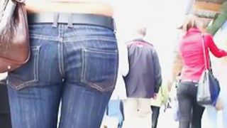 A horny voyeur follows a hot bitch in tight jeans and heels