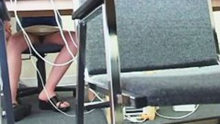 Student woman bare pussy in a library computer room spy video