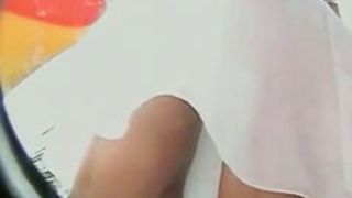White swaying skirt voyeur ass video of a sexy woman