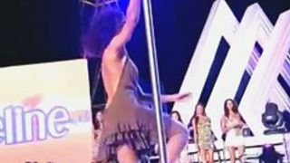 Two pole dancing brunettes on a tv show in an upskirt porno show ass