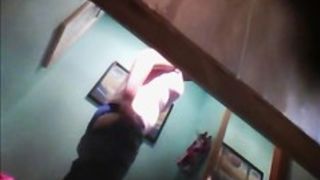 Girl puts on pants and loses of bra on the voyeur camera