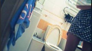 Girl in polka dot dress upskirt masturbation in toilet