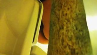 Sexy babe got her yellow panty spied on toilet pissing video