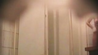 Shower cam tits bounce as girl leans to wash legs
