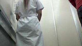 Man ran out of the lift after having pulled the skirt up