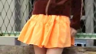 Her orange skirt was sharked by some total stranger