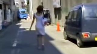 Brown haired Asian beauty skirt sharked on the street