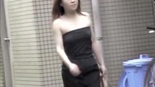 Man pulls the dress of japan beauty down