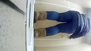 Teen in jeans caught peeing