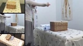 Lovely Asian babe gets fingered in voyeur massage video