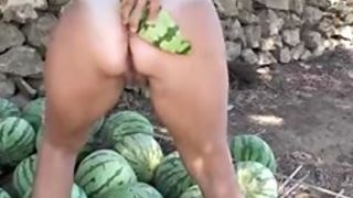 Curvy MILF in public masturbation action with watermelons