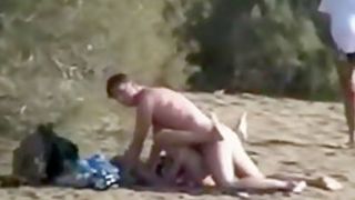 Amateur couple caught fucking on beach