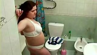 My chubby girlfriend in bathroom spied with hidden cam