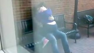 Students humping on a bench in public