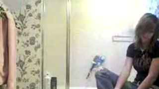 Punk girl getting ready for shower sees hidden cam