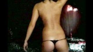Dark-haired chick dancing naked