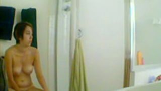 Cute girl spied while singing and pissing