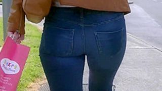 Candid ass in tight jeans tan leather jacket