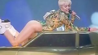 Miley Cyrus slideshow with erotic scenes in revealing outfits