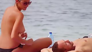 Hot body brunette with perfect big tits on topless beach