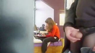 Rubbing the penis in the library