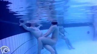 Nudists in the pool get filmed underwater