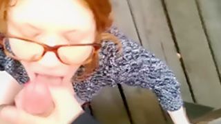 Redhead blows and fucks in public