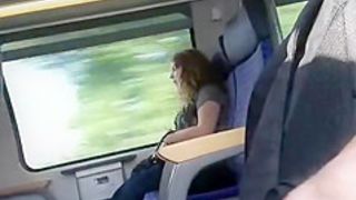 Guy plays with his cock in the train