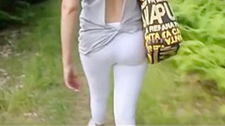 Woman in white leggings