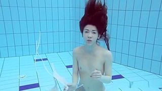 Roxalana Swims Like A Fish With Her Tight Pussy