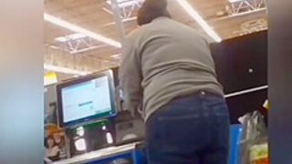Sexy ass on brunnete milf in jeans at self checkout