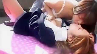 2 Lesbian Japanese student are kissing outside school