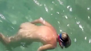 Naked diving girl spied by a voyeur
