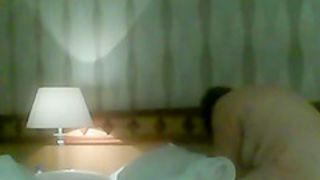 Chubby nude wife bends over to make bed