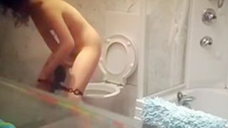 Teen spied peeing and dressing